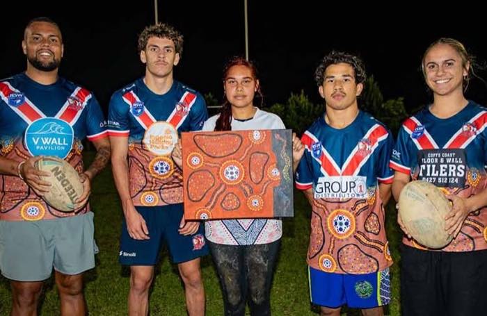 Nambucca Roosters players with the Indigenous Round jersey artwork